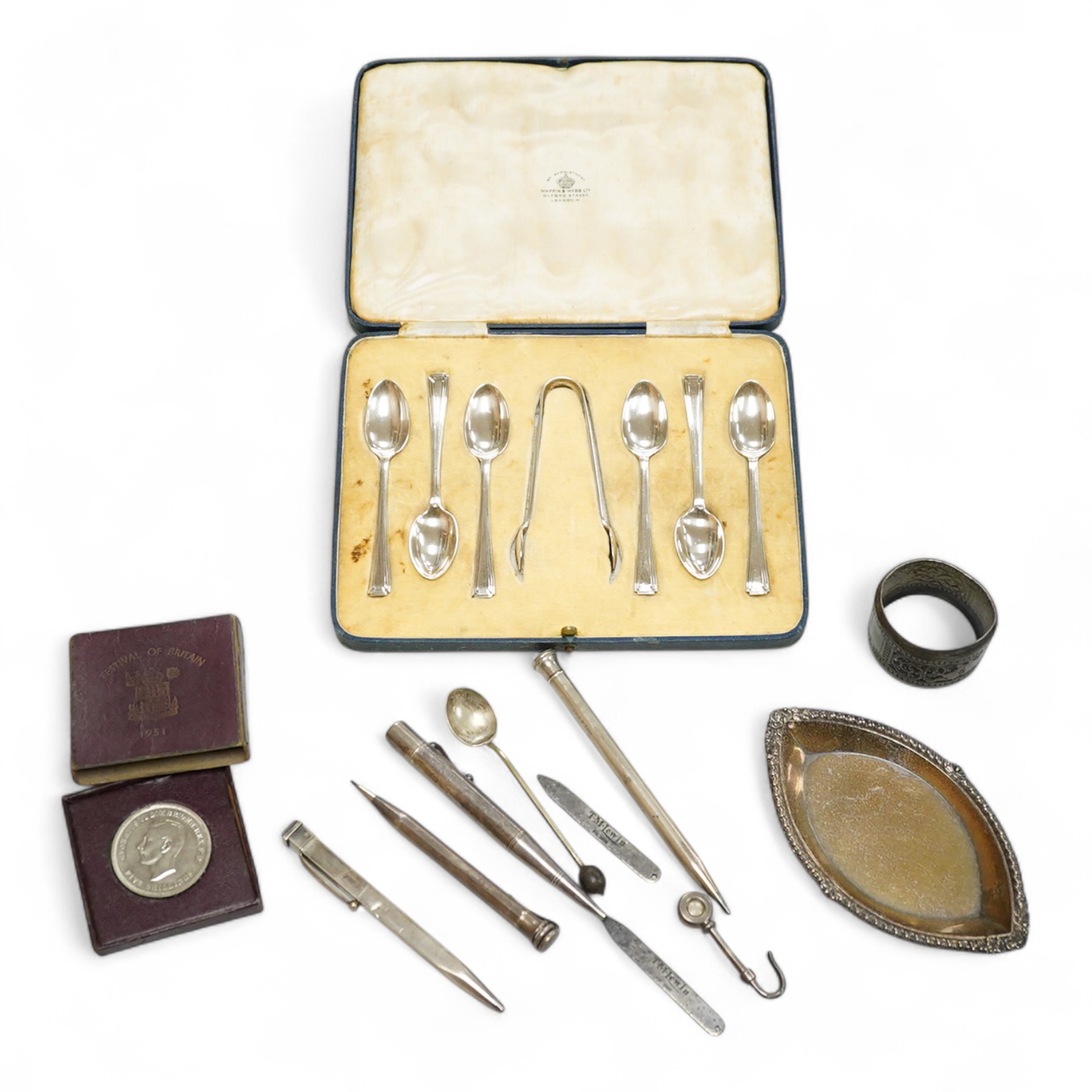 A cased set of six George V silver coffee spoons and pair of sugar tongs by Mappin & Webb, Sheffield, 1935, together with sundry other items including three silver pencils and one sterling pencil, two T.M. Lewin collar s